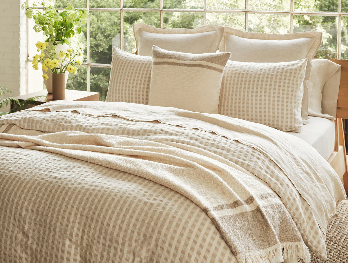Coyuchi Organic Pampas Throw in Undyed with natural - made bed #colour_undyed w/natural