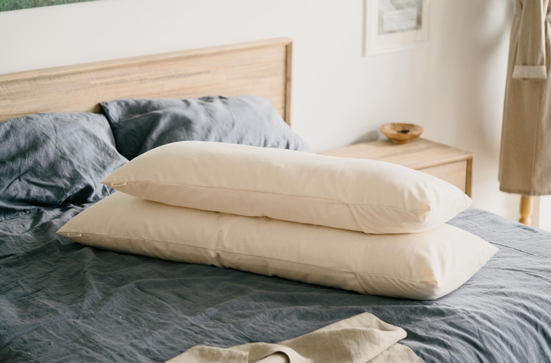 Stacked sizes of Kakun Organic Wool Body Pillows