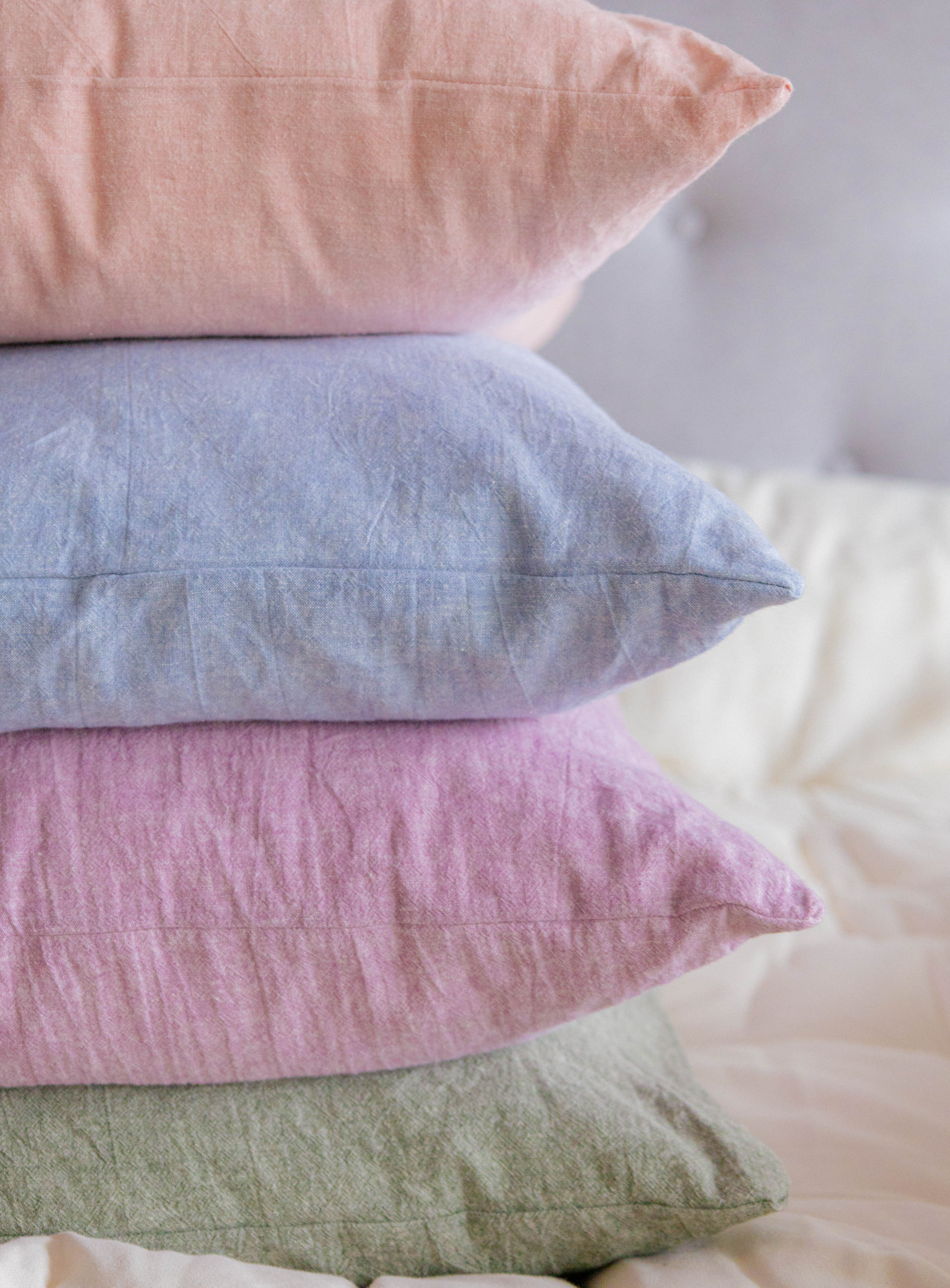 stack of Kakun Body Pillows with pastel colour case showing the end of the pillows