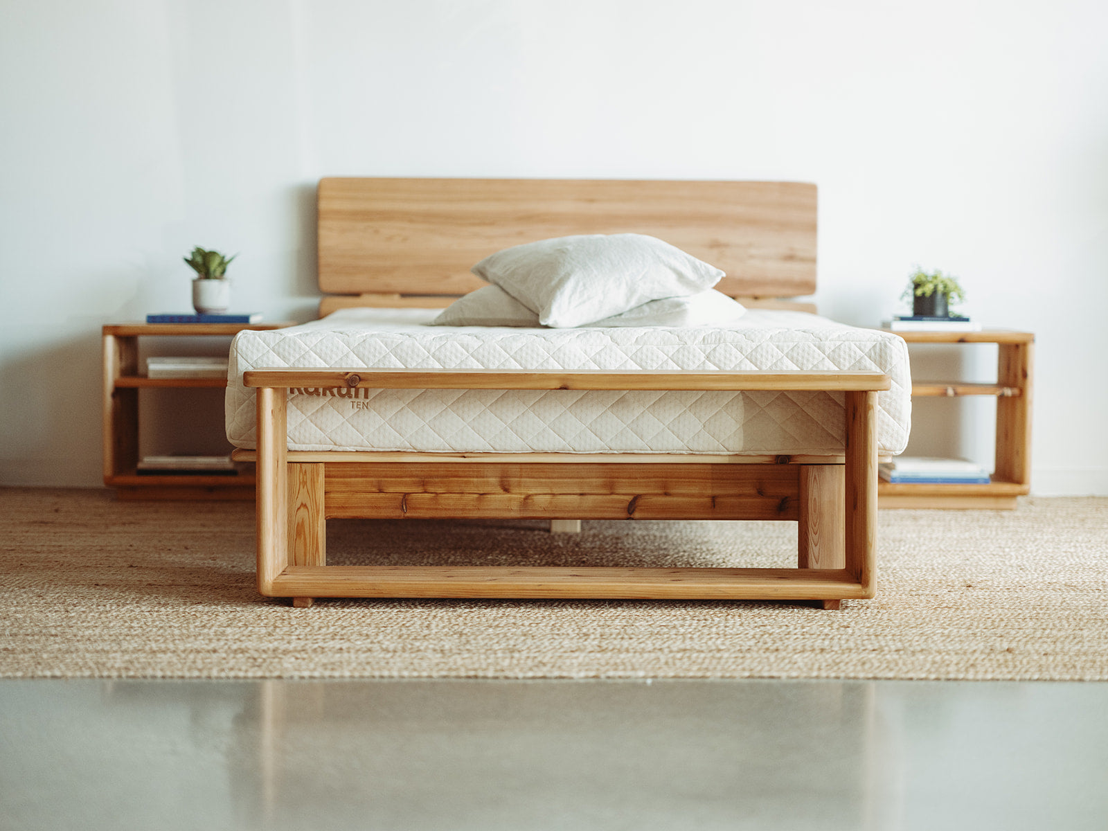 Adrift Cedar Crest Bench - in front of mattress and matching frame