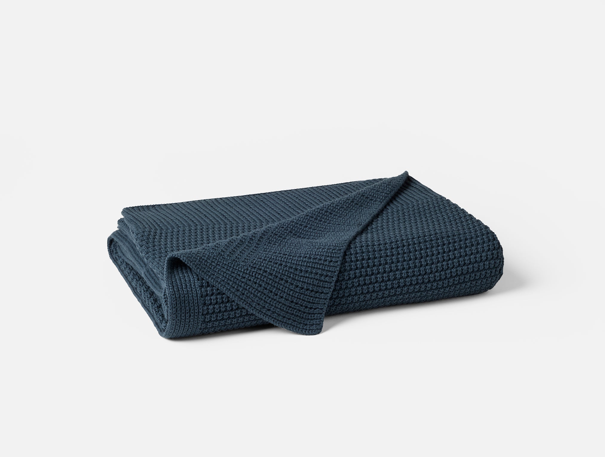 Coyuchi Avalon Organic Knit Throw - folded #colour_twilightblue