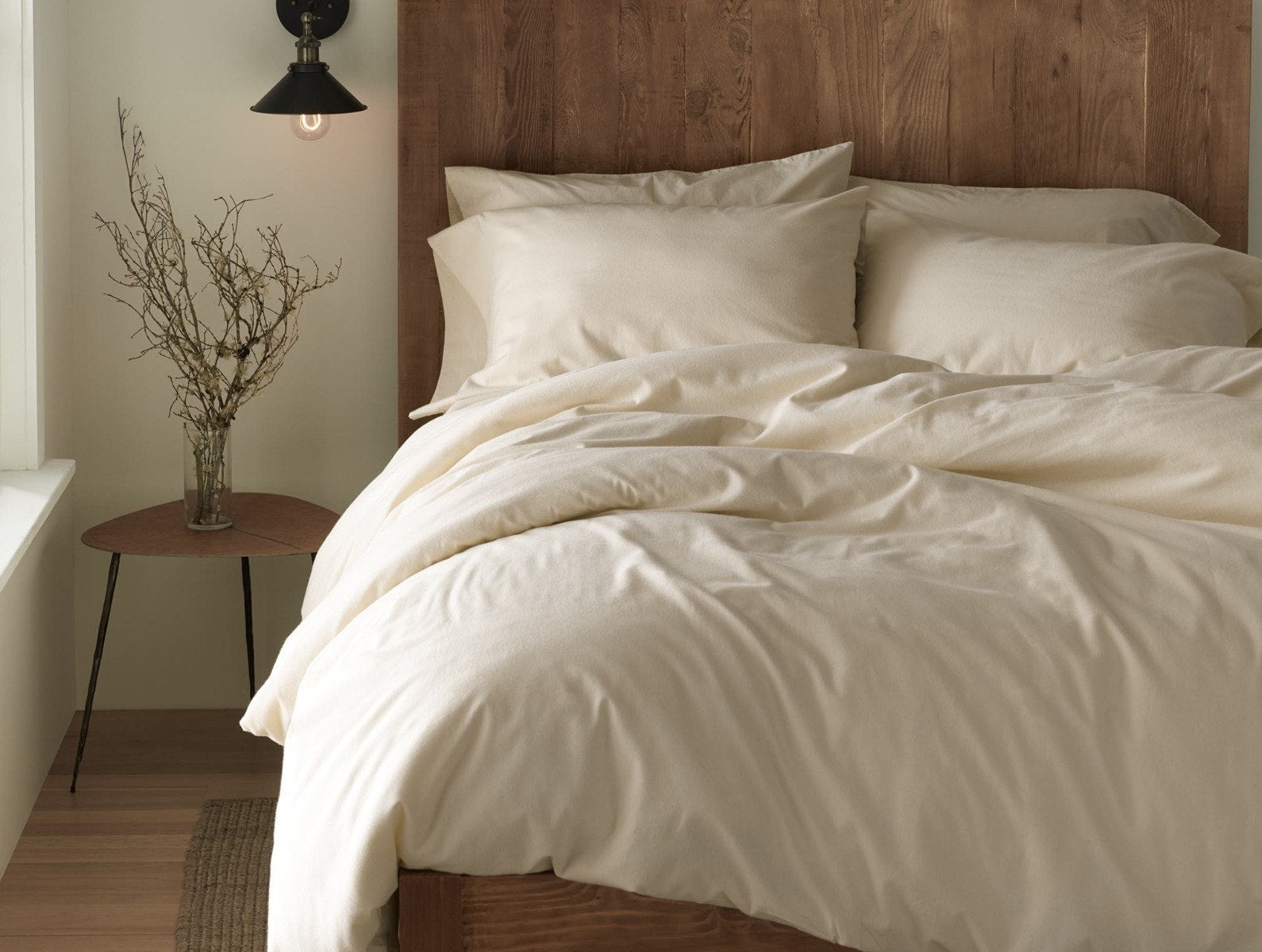 Coyuchi Organic Cloud Brushed Flannel Pillowcase - staged bed matching sheets #colour_undyed