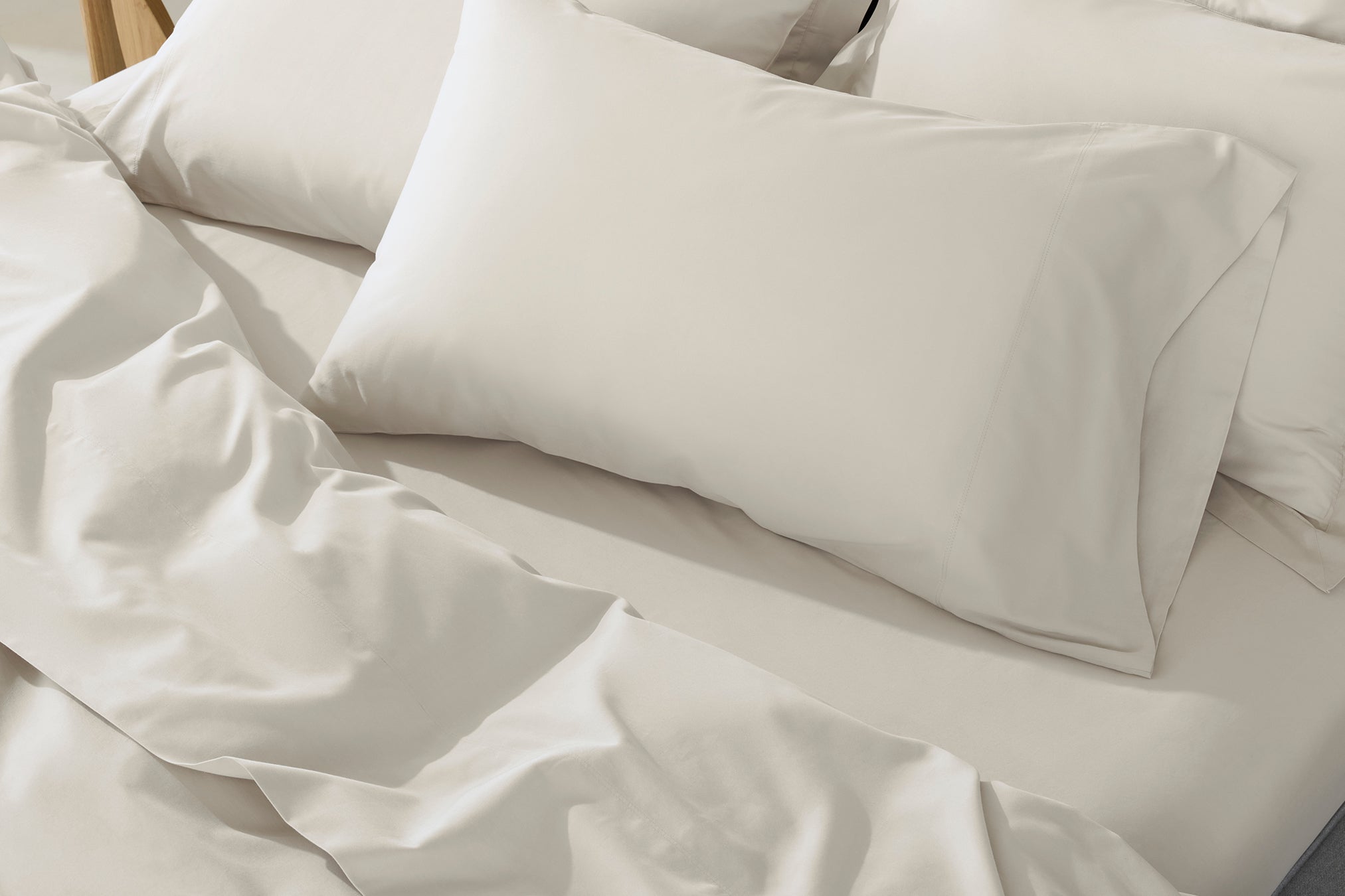 Coyuchi Organic Cloud Soft Sateen Pillowcase - done up bed matching sheets #colour_stone