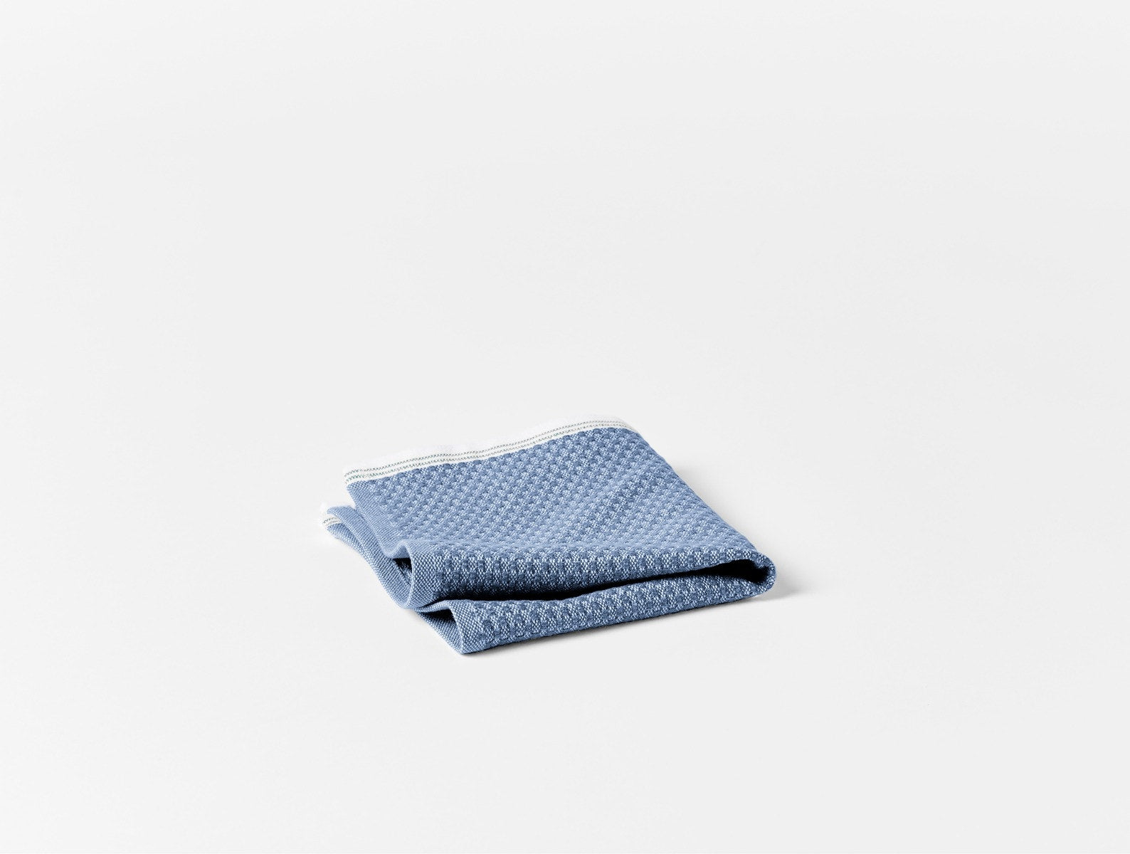 Coyuchi Organic Cotton Mediterranean Wash Cloth - folded #colour_Lake w/ Sea Spray Stripes