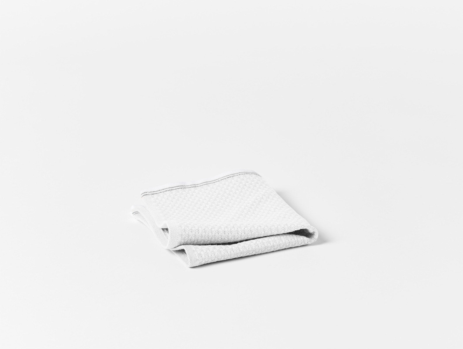 Coyuchi Organic Cotton Mediterranean Wash Cloth - folded #colour_Alpine White w/ Slate Stripes