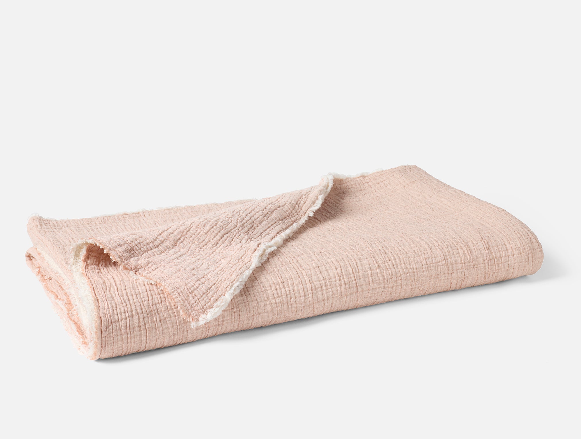 Coyuchi Organic Cotton Topanga Matelasse Blanket - folded #colour_praline chambray