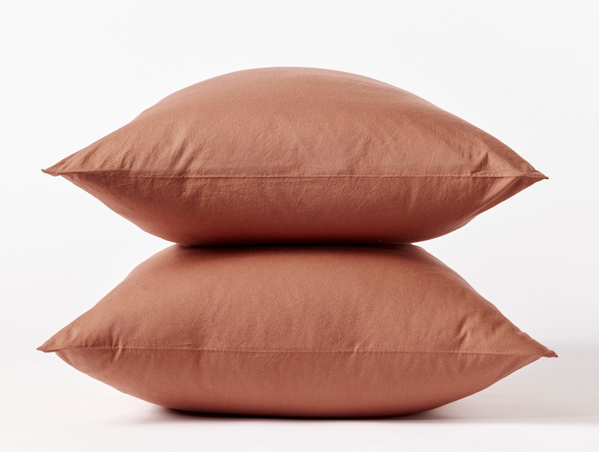 Coyuchi Organic Crinkled Percale Pillowcase - stacked with white background #colour_sedona