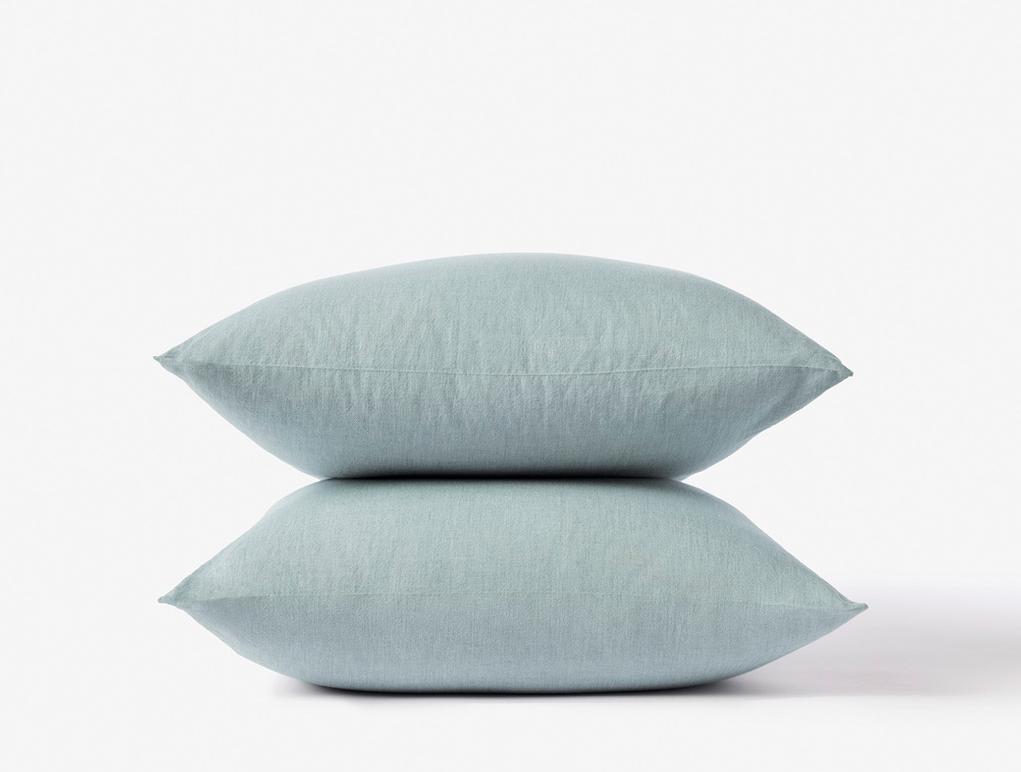 Coyuchi Organic Crinkled Percale Pillowcase - stacked on white background #colour_surf chambray