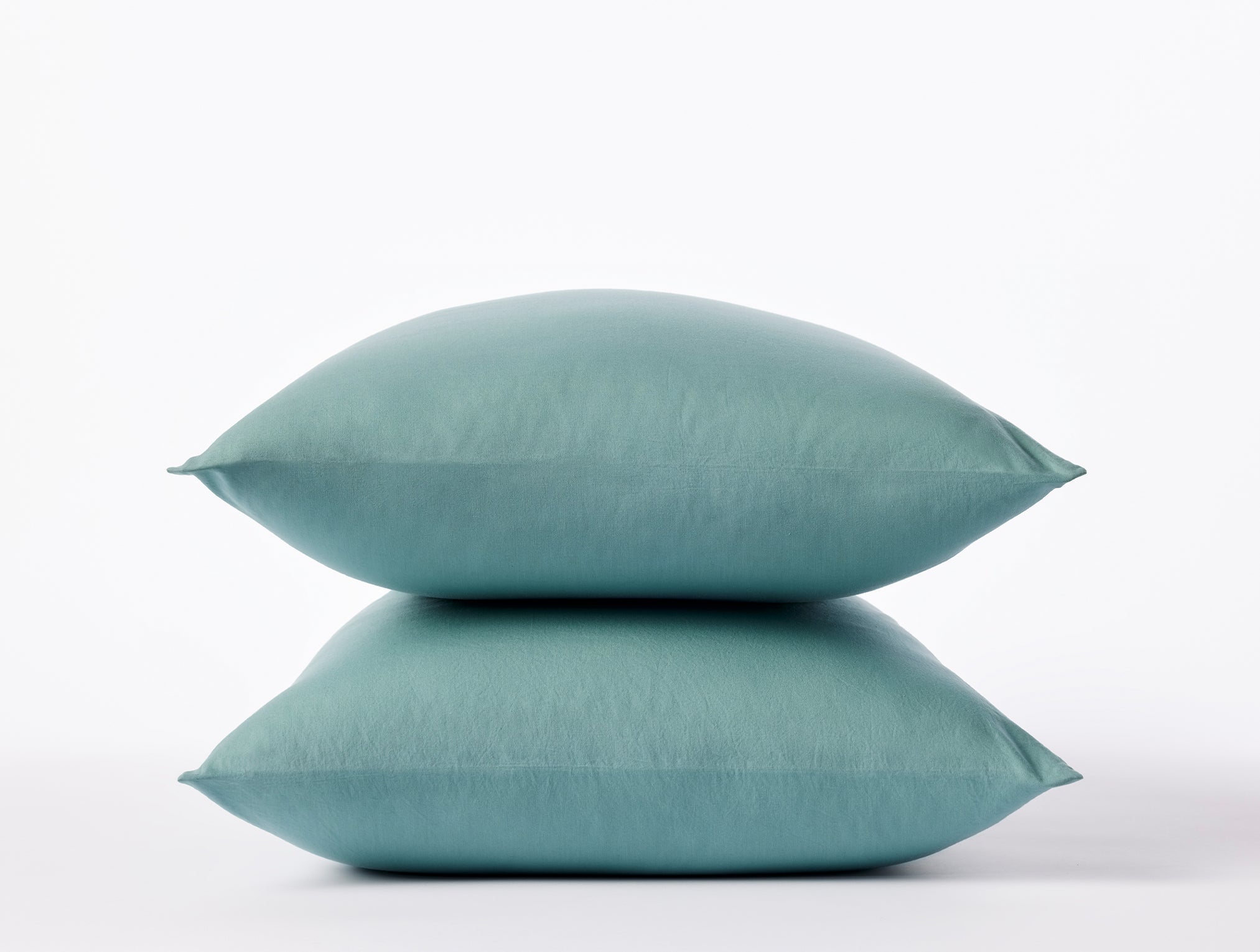 Coyuchi Organic Crinkled Percale Pillowcase - stacked on white background #colour_surf