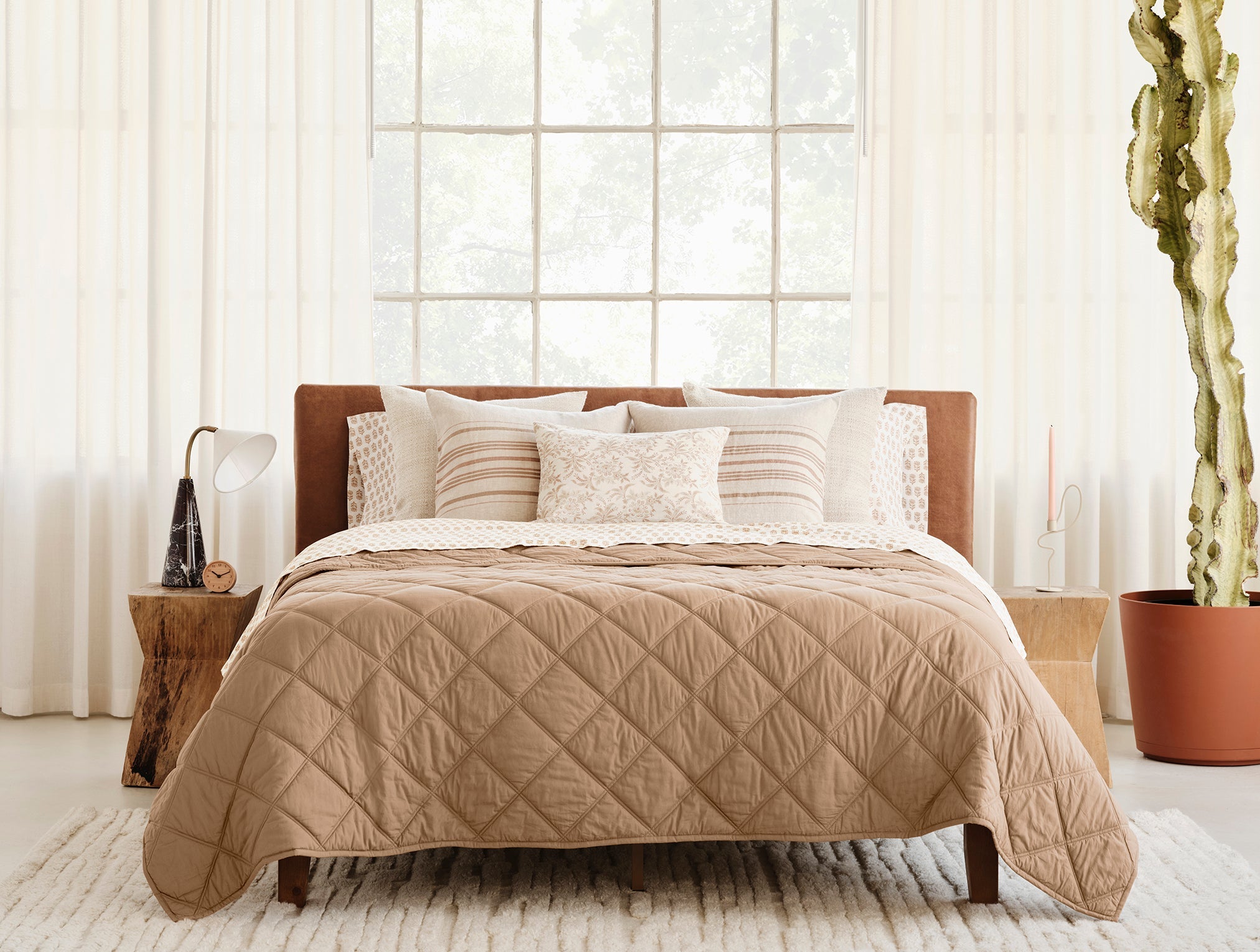 Coyuchi Organic Diamond Stitched Comforter - on bed #colour_Doe