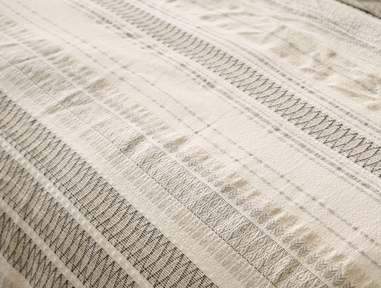 Coyuchi Organic Lost Coast Duvet Cover - close up of pattern #colour_Soft White w/Deep Graphite