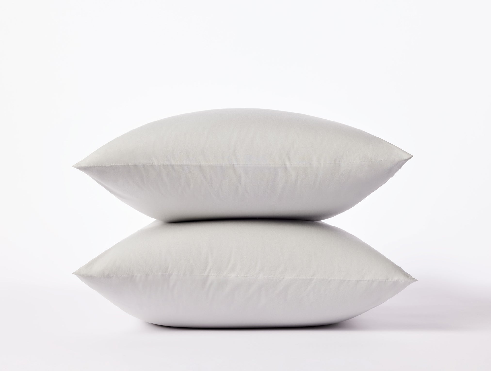 Coyuchi Organic Refined Percale Pillowcase - stacked with white background #colour_seal