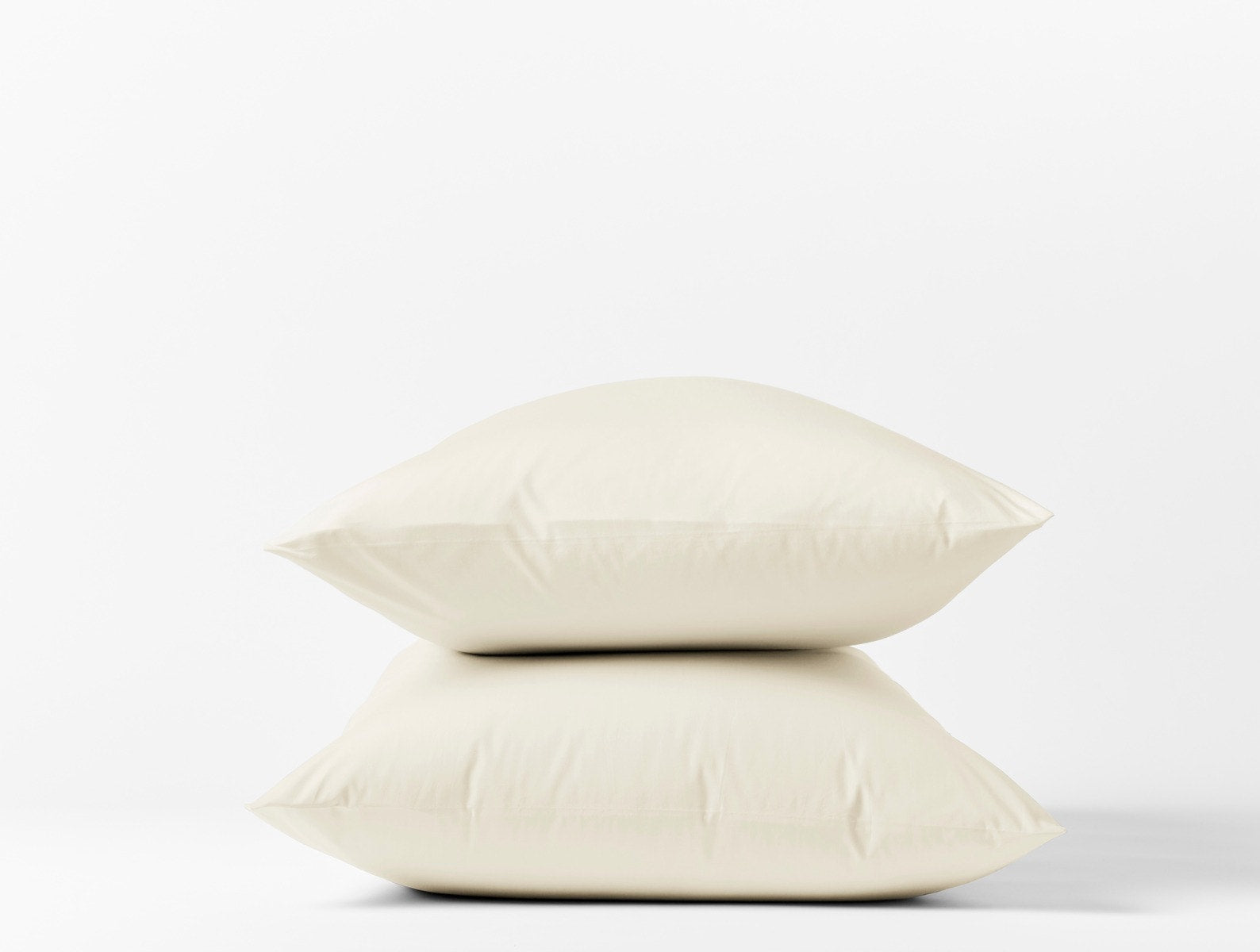 Coyuchi Organic Refined Percale Pillowcase - stacked with white background #colour_undyed