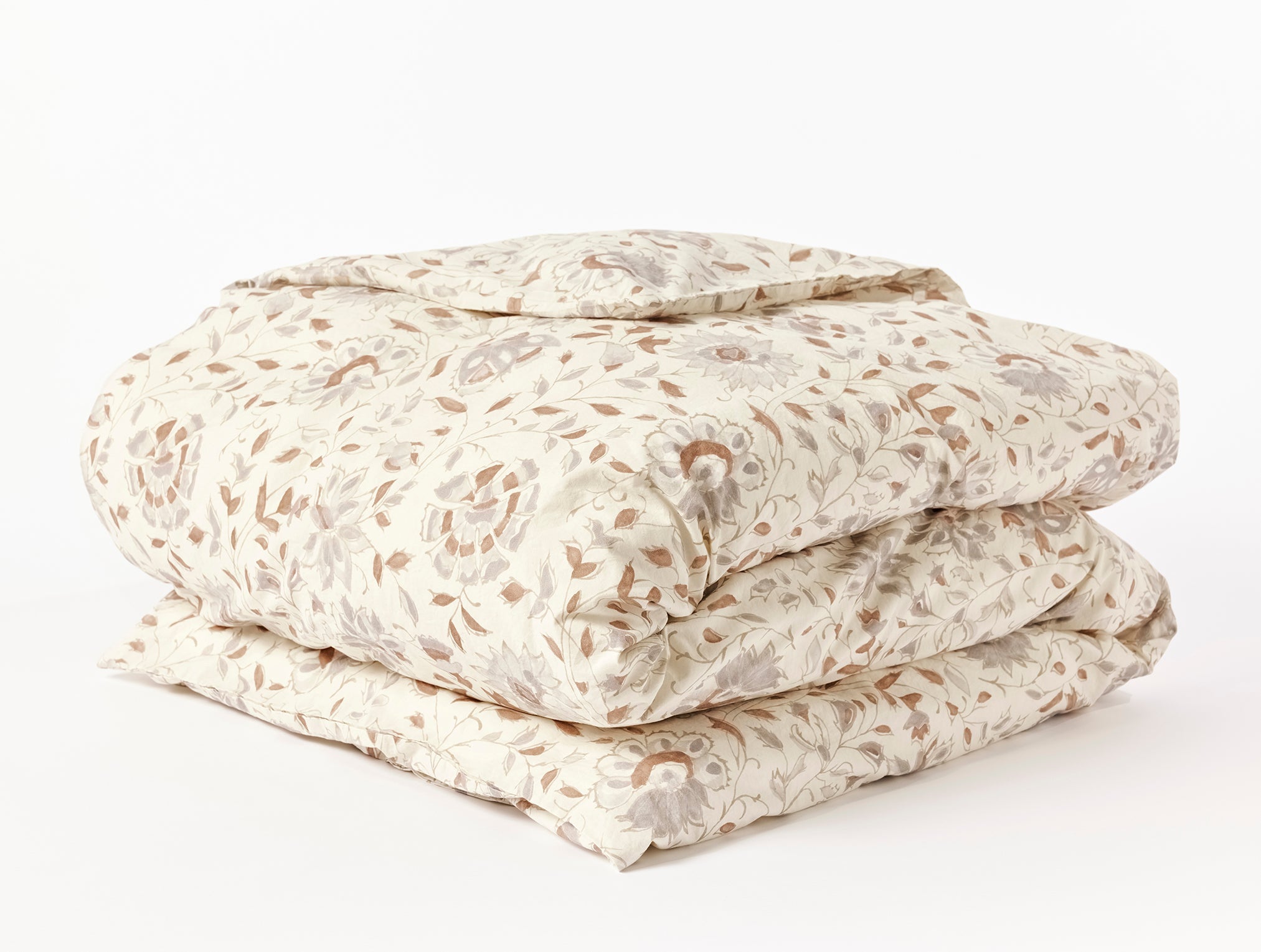 Coyuchi Organic Rejuvenation Flora Print Duvet Cover - folded #colour_undyed w/sedona