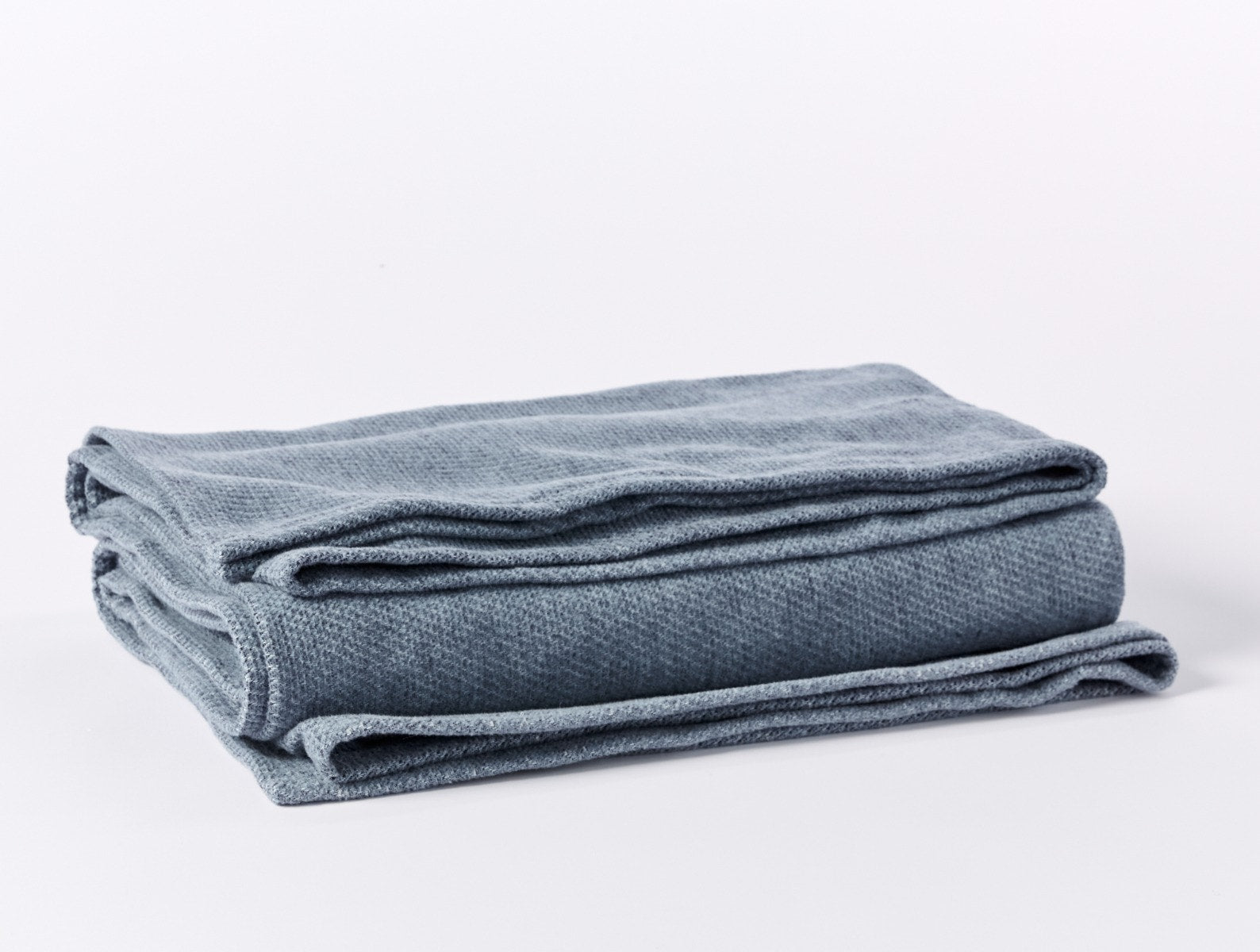 Coyuchi Organic Sequoia Cotton Wool Blanket - folded #colour_blue