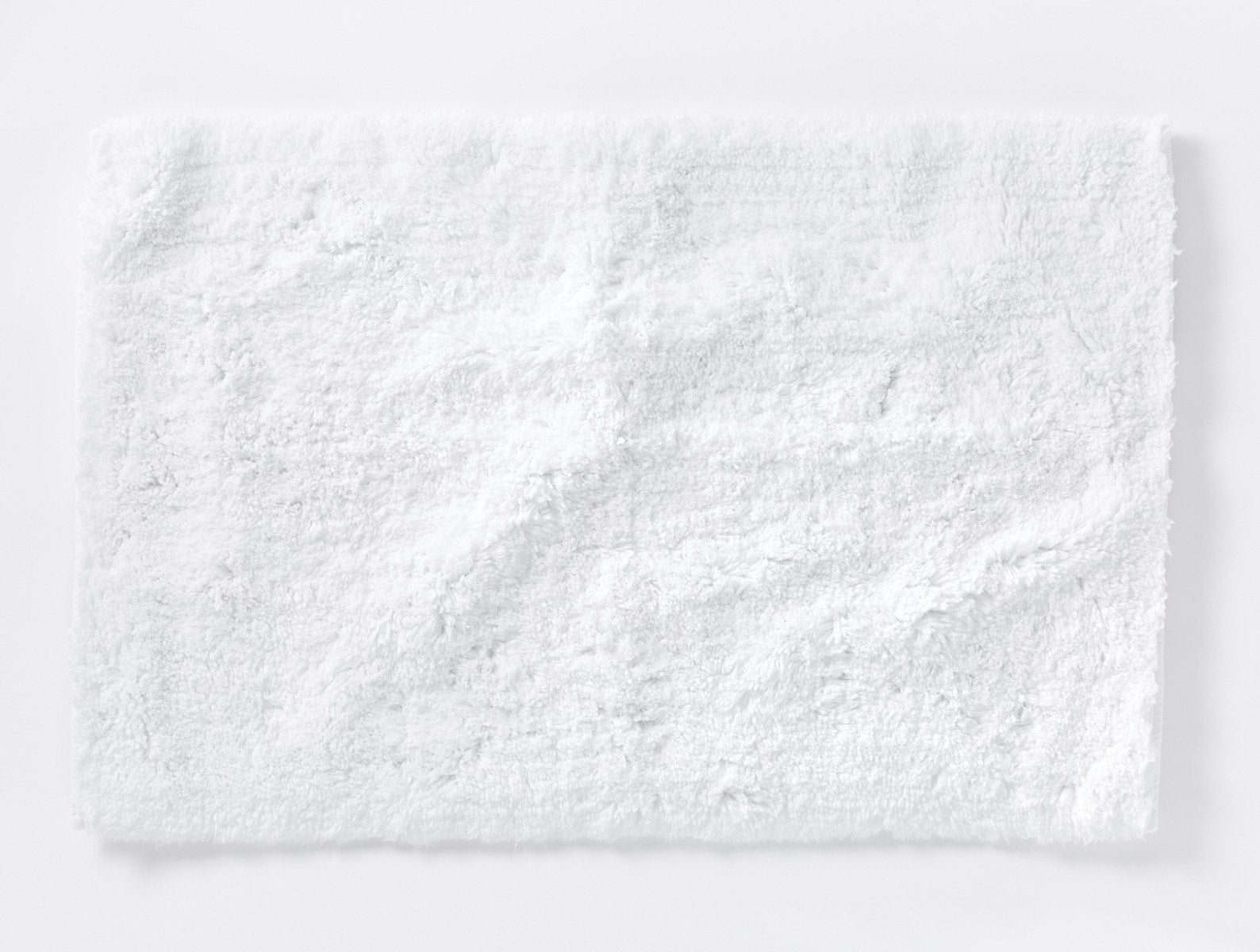 Coyuchi Organic Shag Bath Rug #colour_alpine white