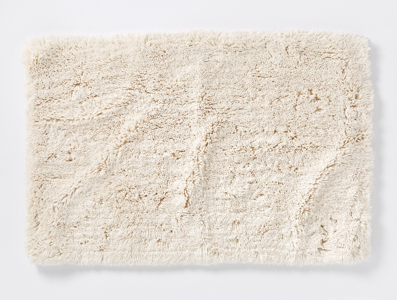 Coyuchi Organic Shag Bath Rug #colour_undyed