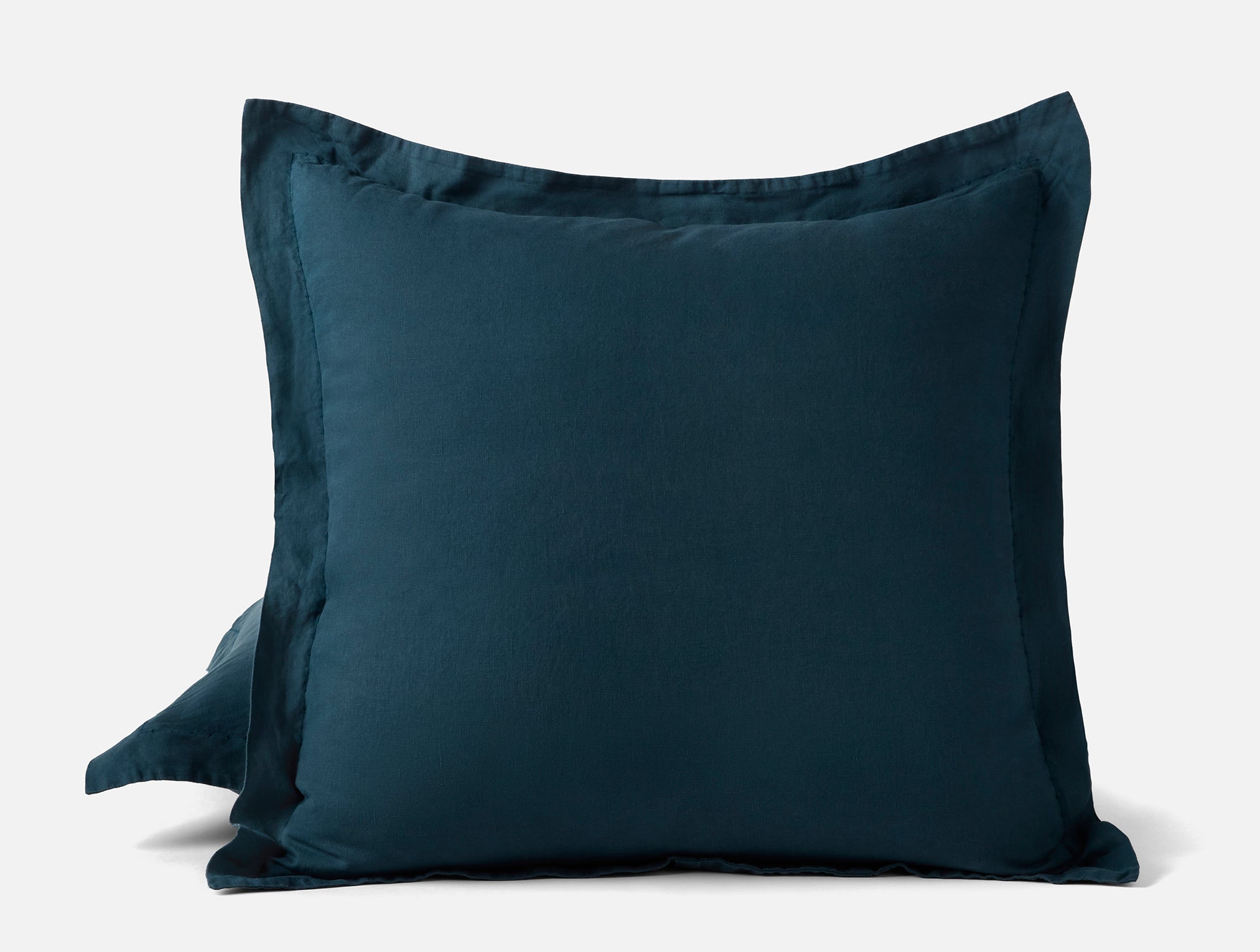 Coyuchi relaxed linen euro sham in midnight indigo on white background #colour_midnight indigo
