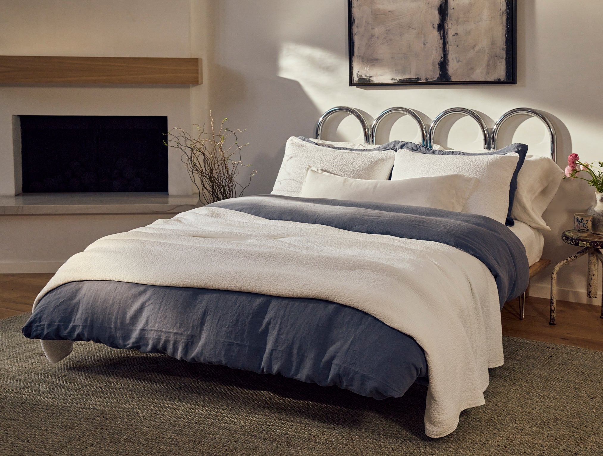 Coyuchi Organic Relaxed Linen Sheet Set in Harbor Blue – styled bed, paired with white cotton accessories. #colour_harbor blue