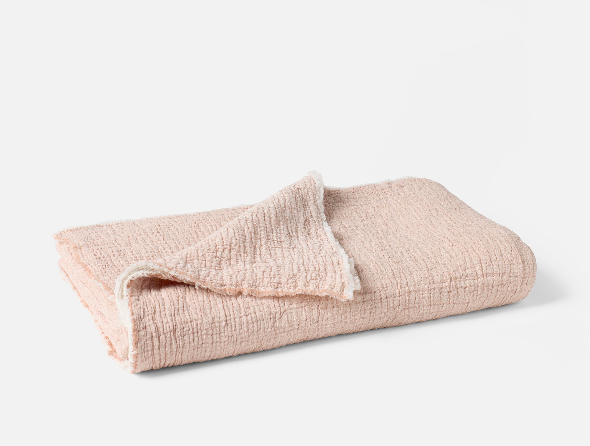 Coyuchi Topanga Organic Cotton Matelasse Throw - folded #colour_praline