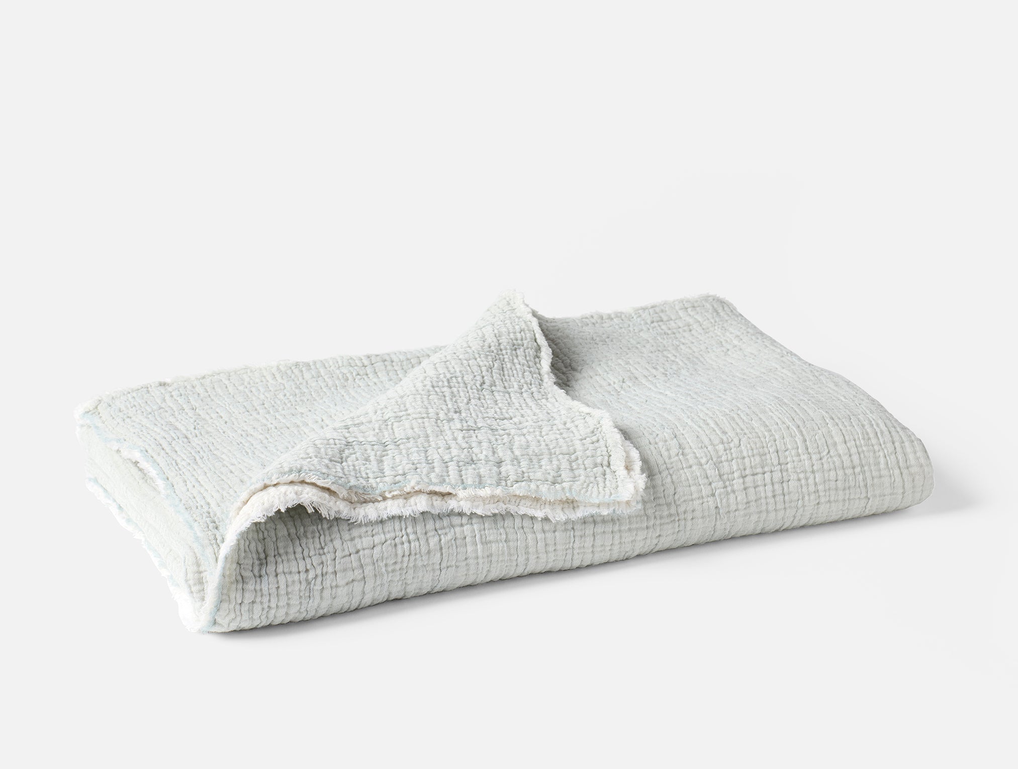 Coyuchi Topanga Organic Cotton Matelasse Throw - folded #colour_tidal chambray