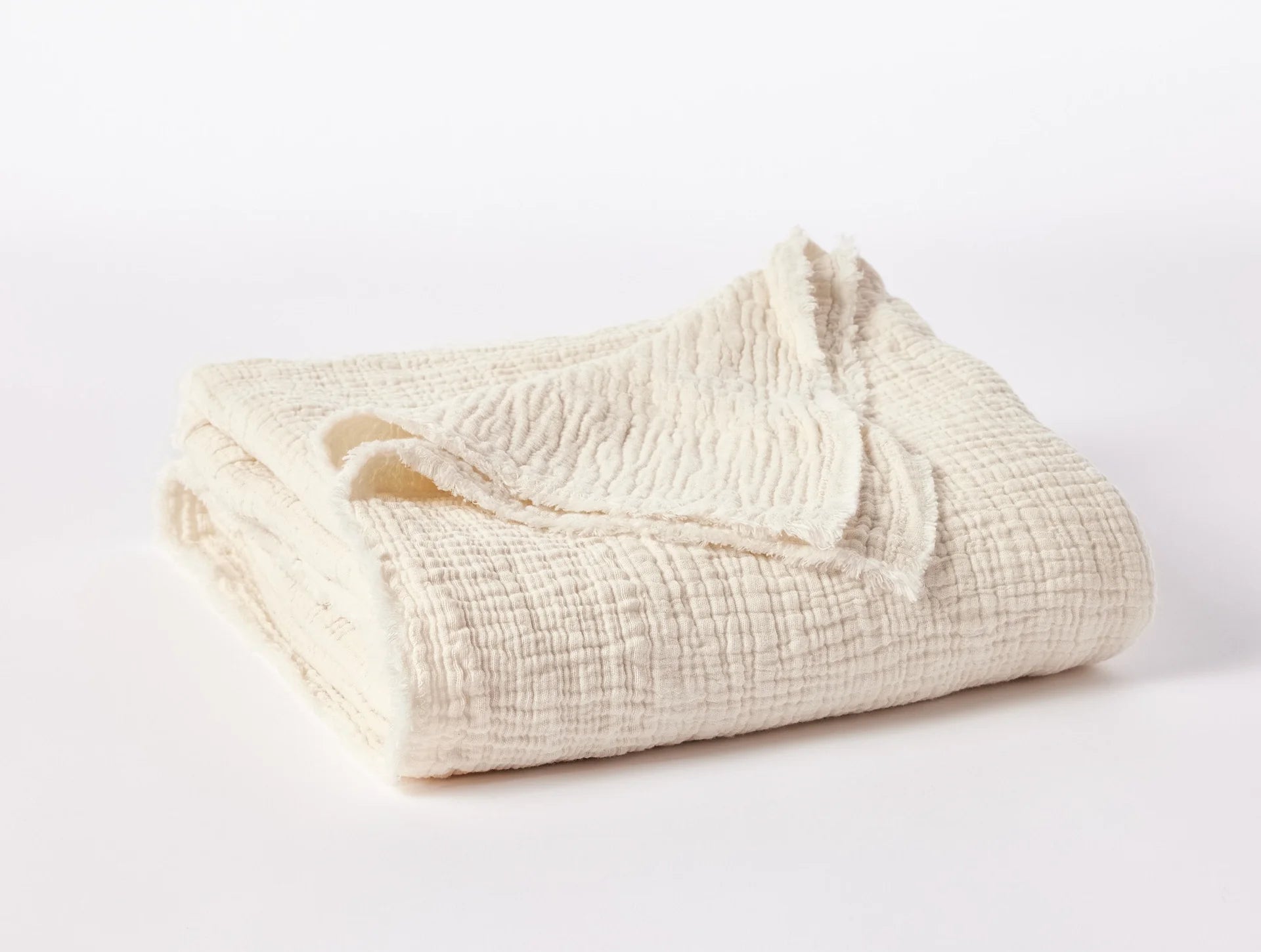 Coyuchi Topanga Organic Cotton Matelasse Throw - folded #colour_Undyed