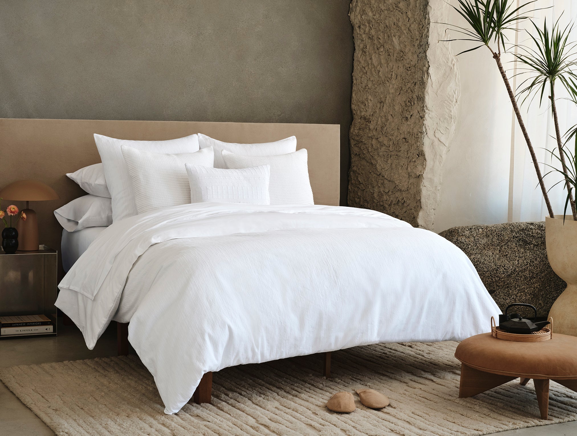 Coyuchi Toro Canyon Organic Duvet Cover - staged bed with area rug #colour_alpine white