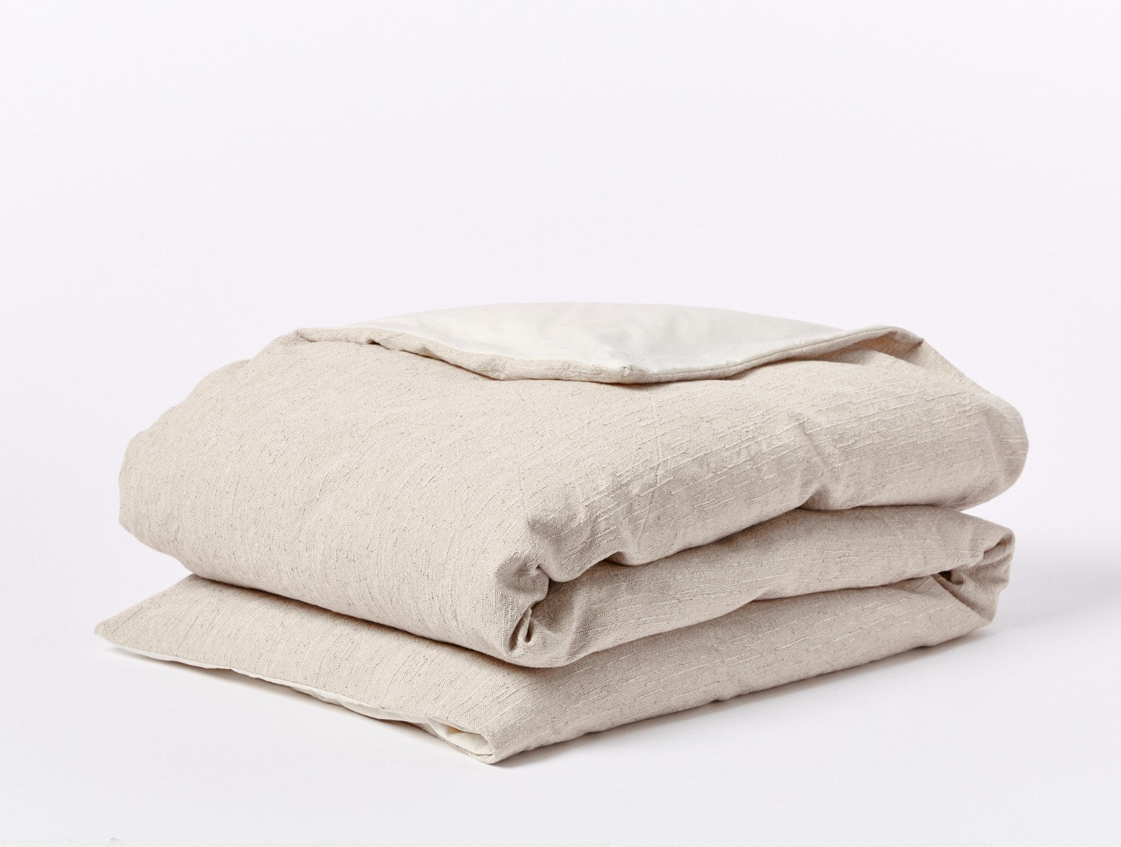 Coyuchi Toro Canyon Organic Duvet Cover - folded #Colour_nutmeg