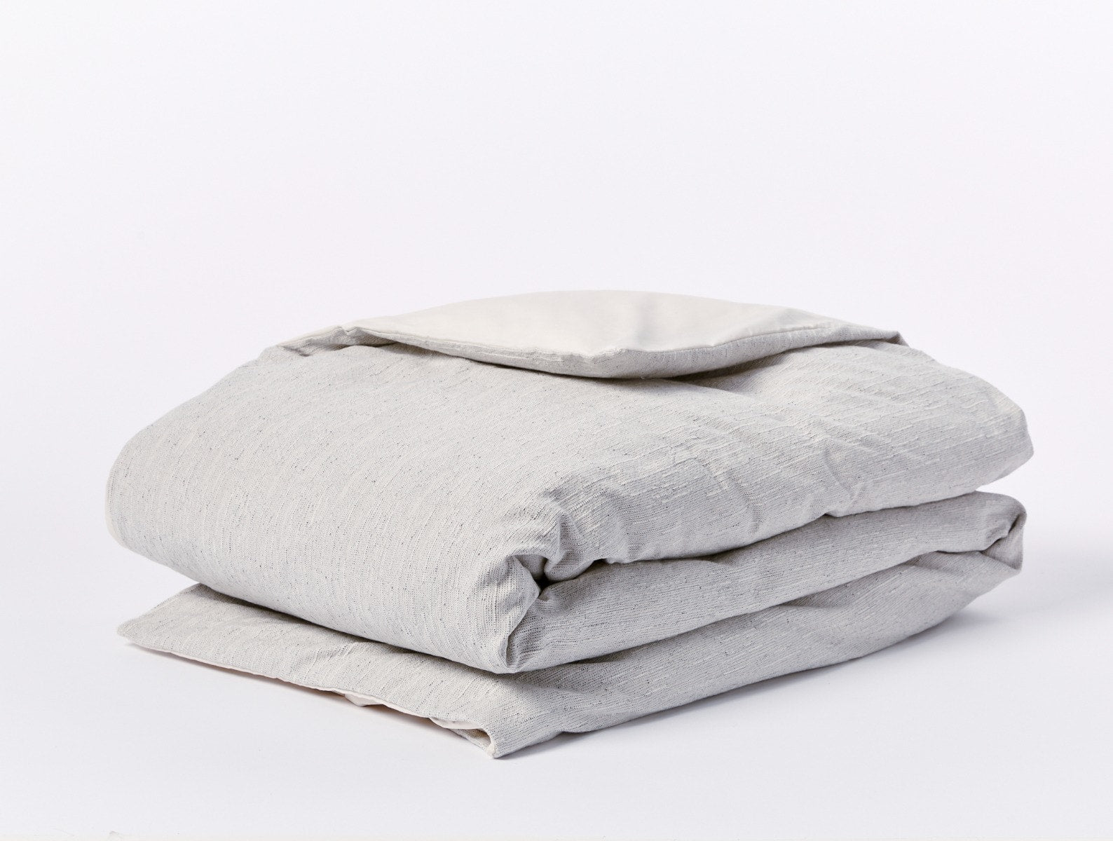 Coyuchi Toro Canyon Organic Duvet Cover - folded #Color_sterling