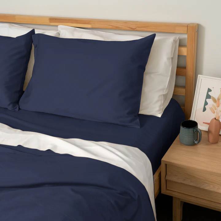 Homebird Organic Cotton Sateen Fitted Sheet and Pillowcase - staged bed #colour_midnight