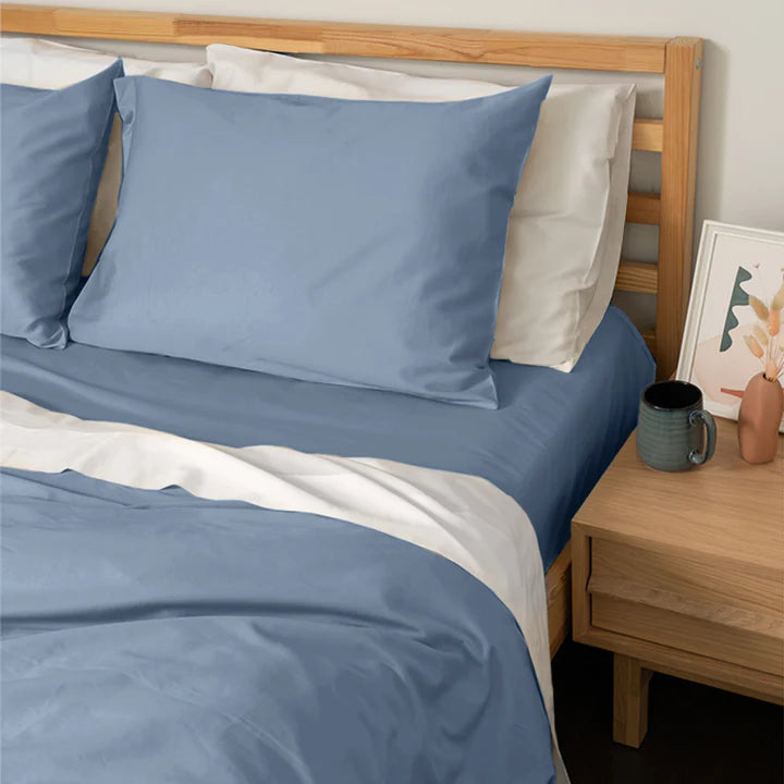 Homebird Organic Cotton Sateen Fitted Sheet and Pillowcase - staged bed #colour_steel blue