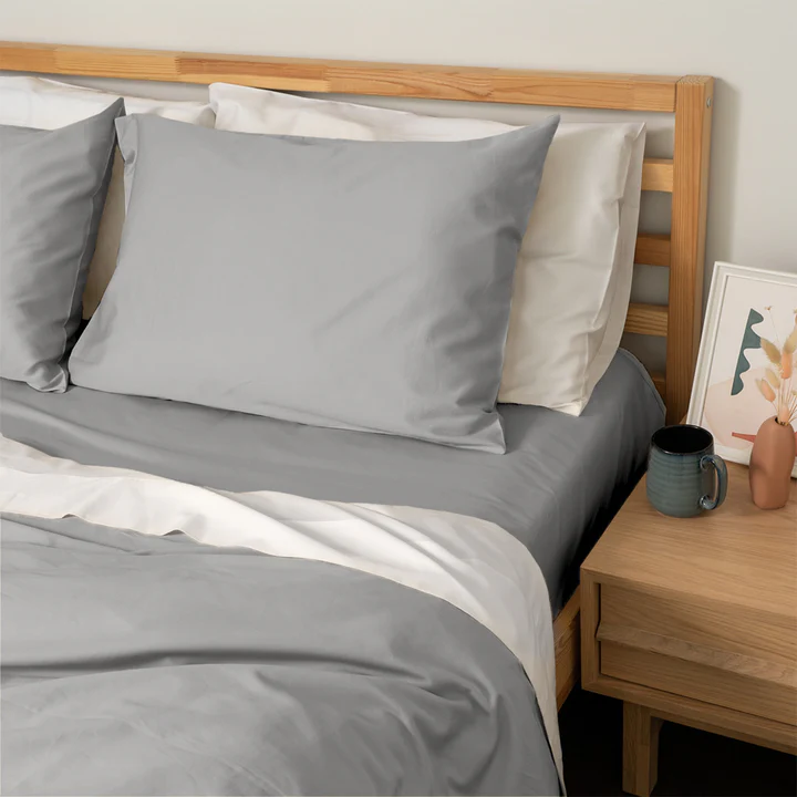 Homebird Organic Cotton Sateen Fitted Sheet and Pillowcase - staged bed #colour_stone