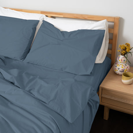 Homebird Organic Percale Duvet Cover and Pillowcase - staged bed #colour_ink