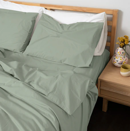 Homebird Organic Percale Duvet Cover and Pillowcases - staged bed #colour_sage green