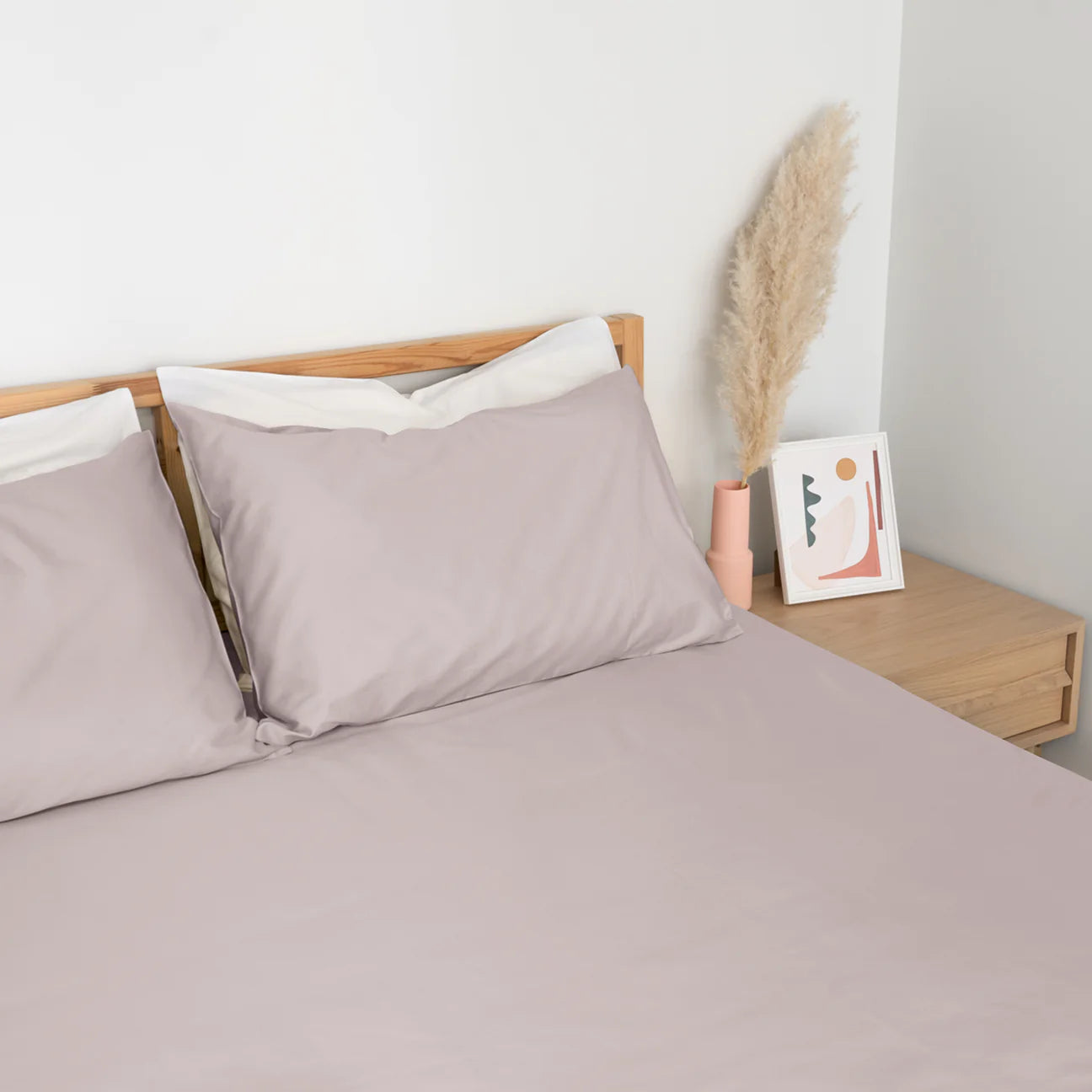 Homebird Organic Percale Fitted Sheet and Pillowcases - staged bed #colour_dusty pink