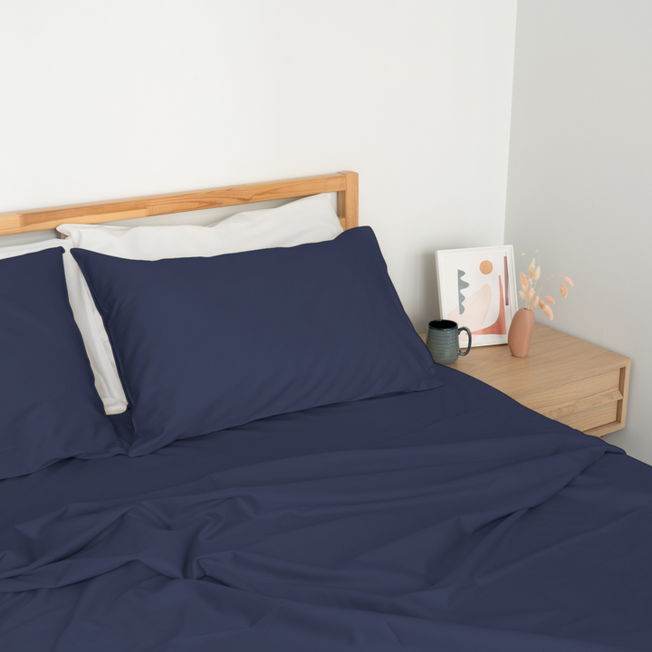 Homebird Organic Sateen Flat Sheet - staged bed #colour_midnight