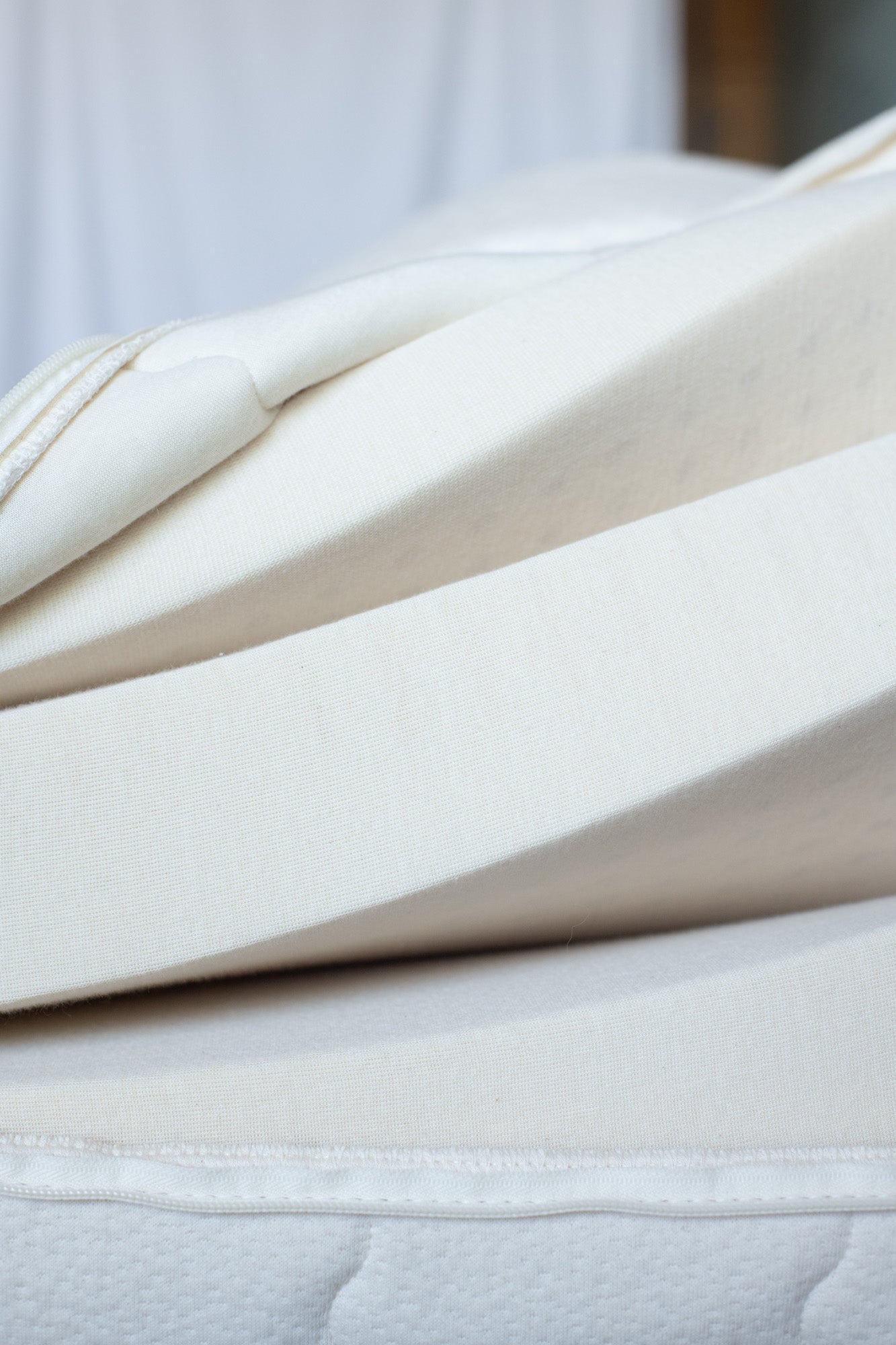 Kakun Eight Organic Latex Mattress - casing open showing layers partially lifted