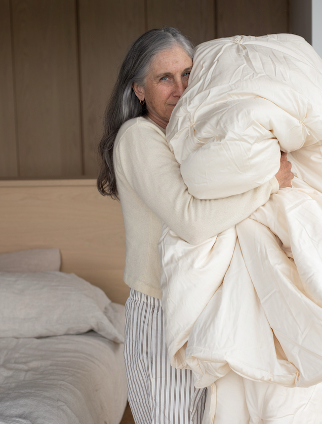 Kakun Luxury Wool Comforters - shown being held by model