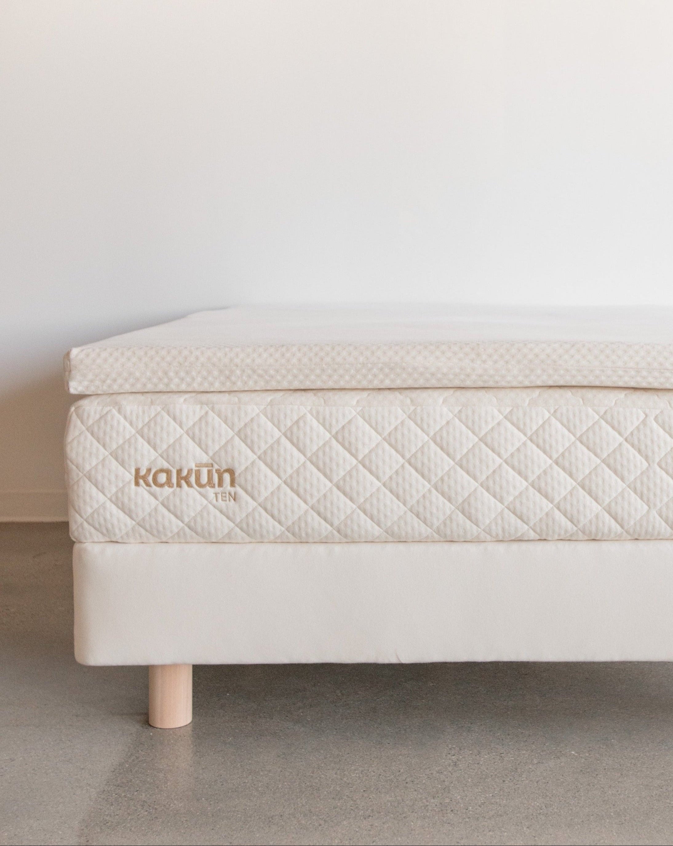 Kakun Organic Latex Mattress Topper - topper shown on mattress and foundation