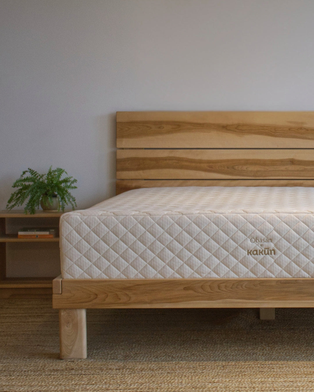 Wooden bed frame with an Obasan Kakun organic latex mattress