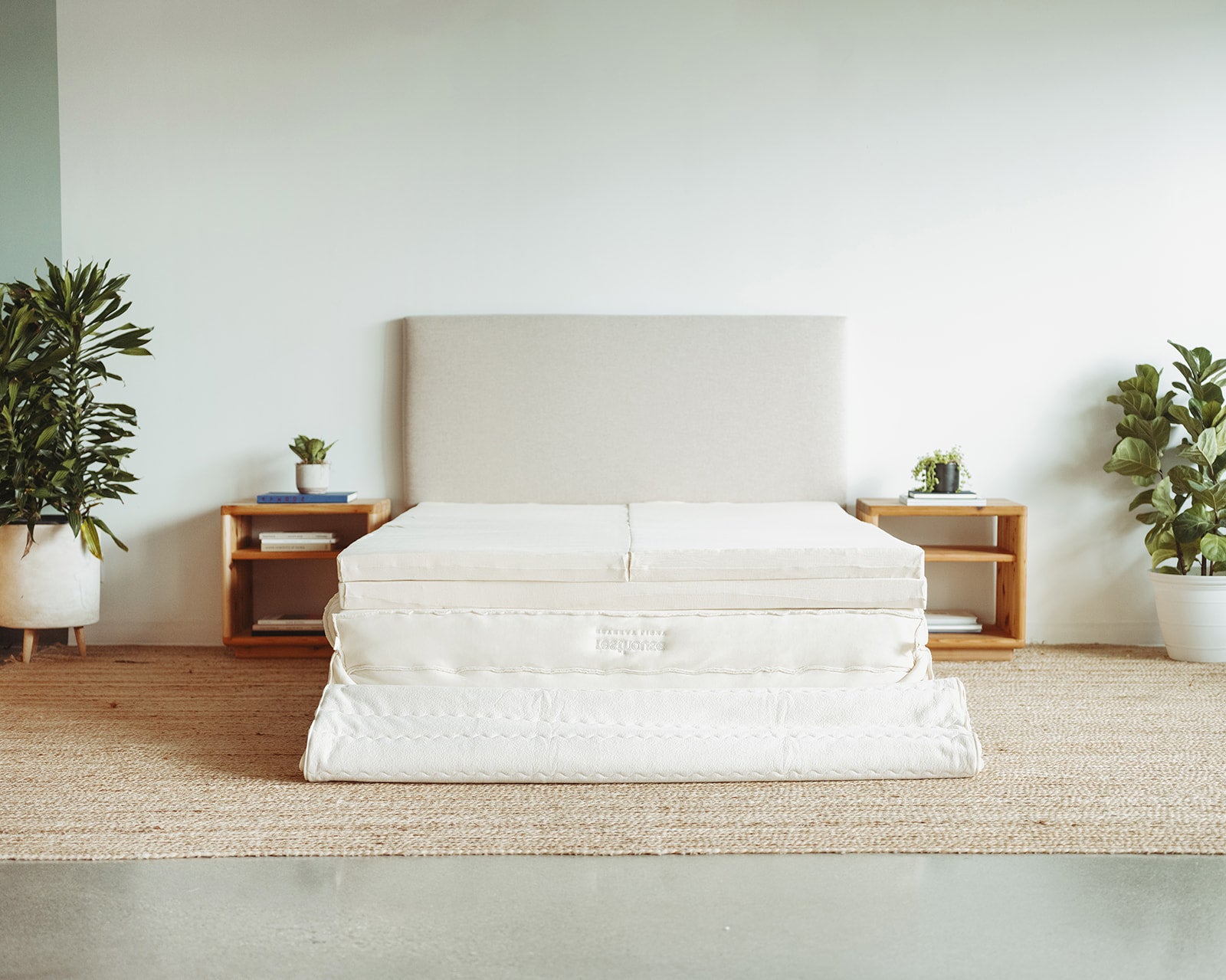 Resthouse Retreat Light Organic Latex Mattress - unzipped cover folded back staged with plants