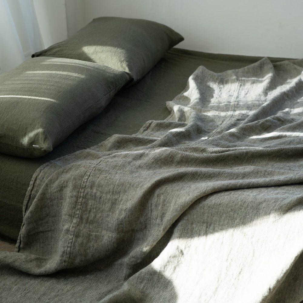 European Linen by Somn - bedspread in Olive with natural light #colour_olive