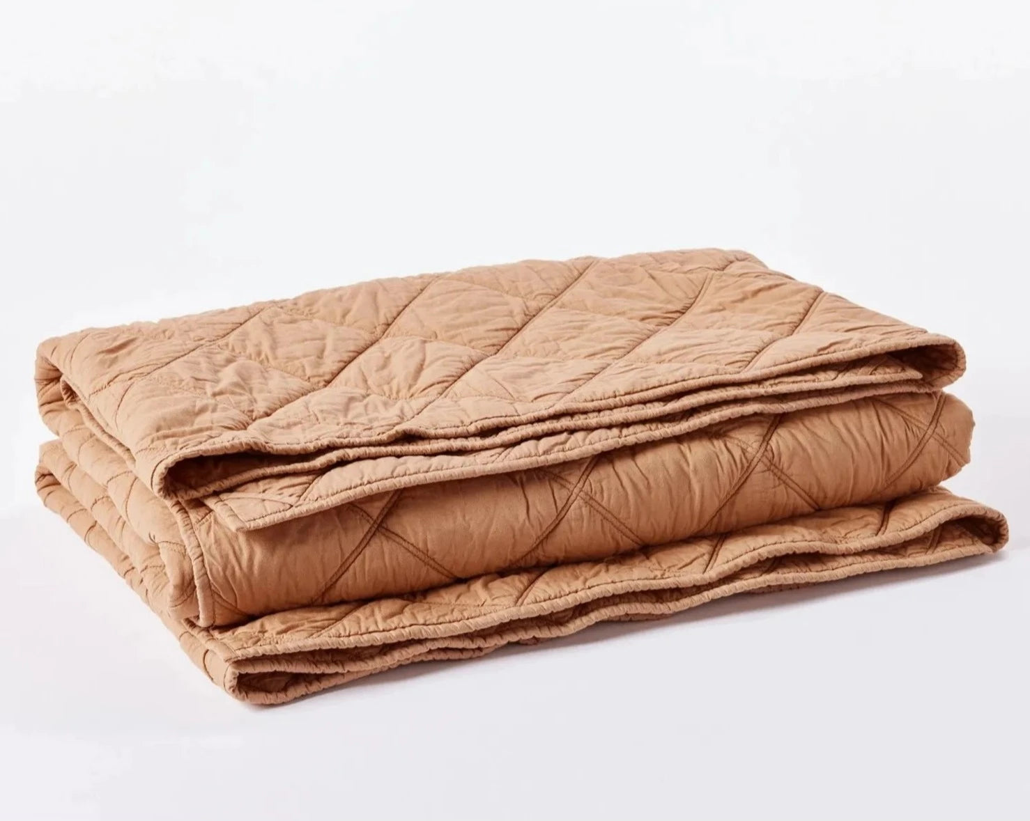 Coyuchi Organic Diamond Stitched Comforter - folded #colour_ginger