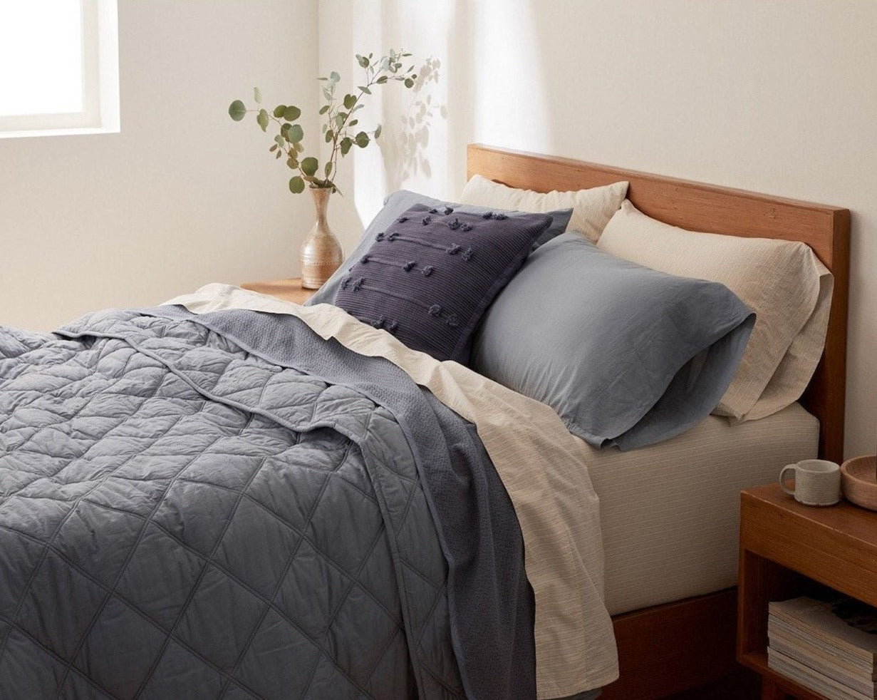 Coyuchi Organic Diamond Stitched Comforter - staged bed soft natural light #colour_steel blue