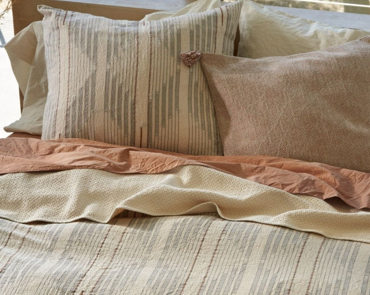 Coyuchi Organic Morelia Duvet Cover - staged bed focused on matching pillow #colour_harvest