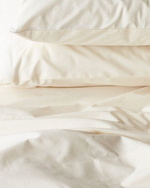 Coyuchi Organic Refined Percale Pillowcase - close up stacked #colour_undyed