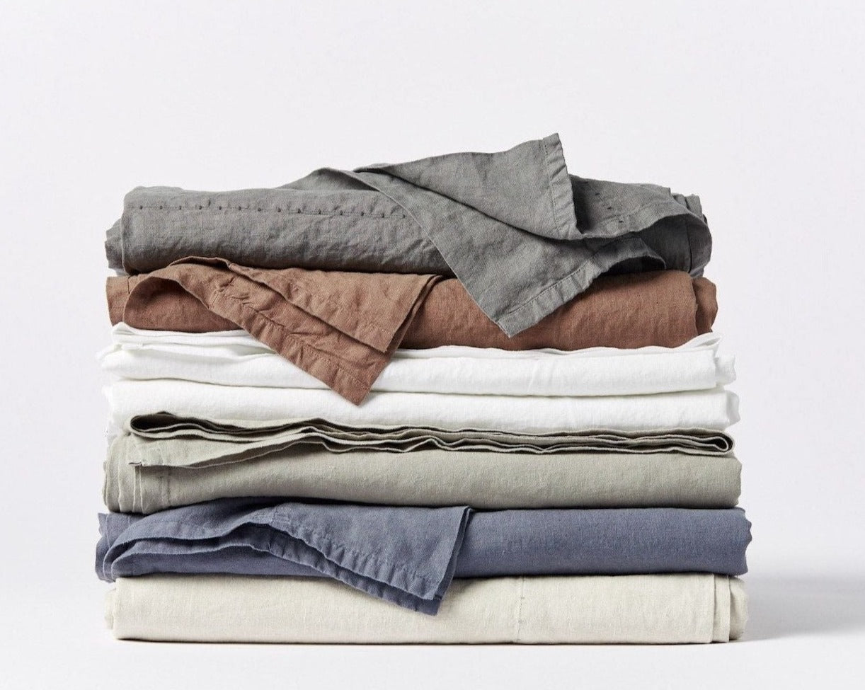 Coyuchi Organic Relaxed Linen Sheet Set – stacked display, showcasing each colour. #colour_laurel