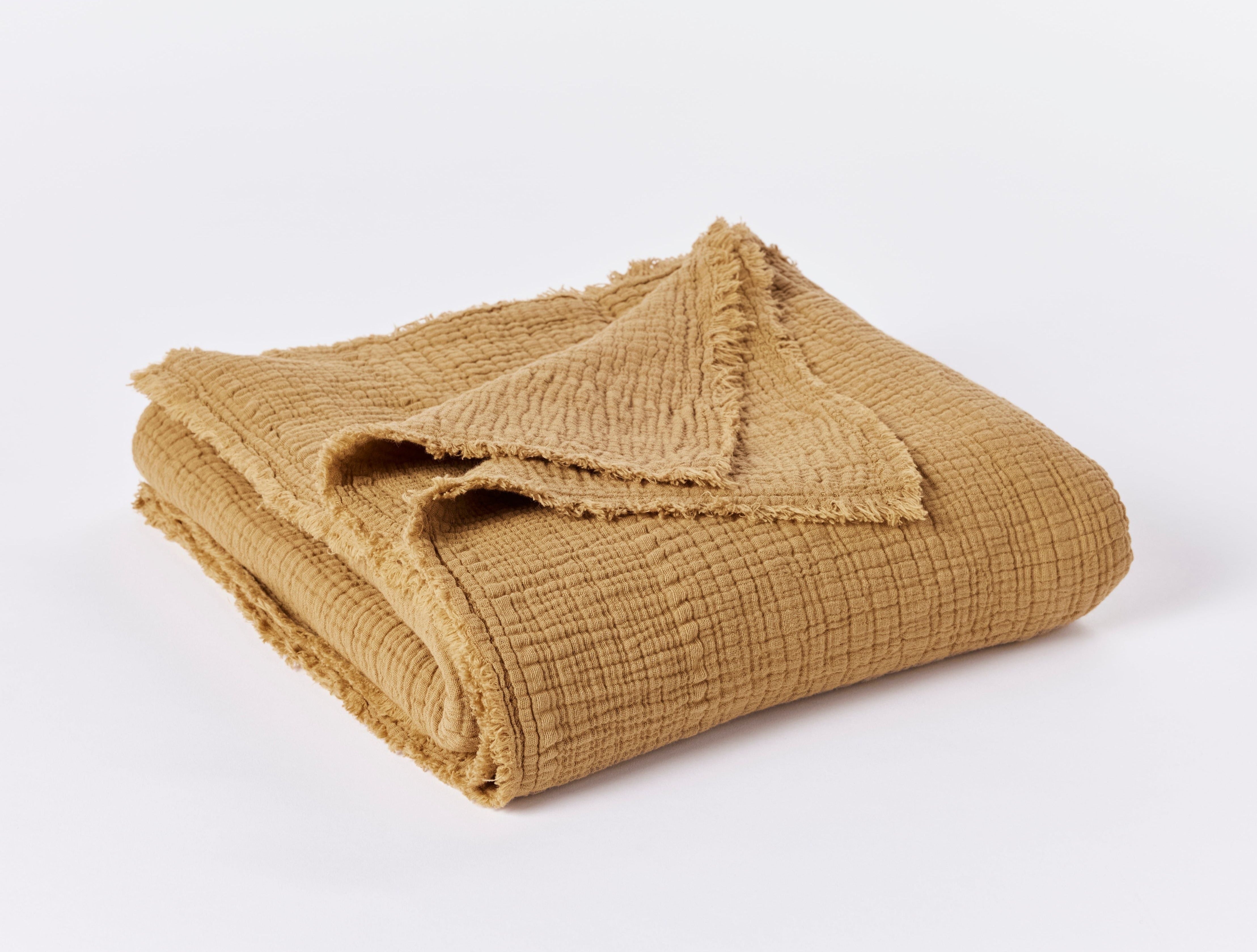 Coyuchi Topanga Organic Cotton Matelasse Throw - folded #colour_Hazel