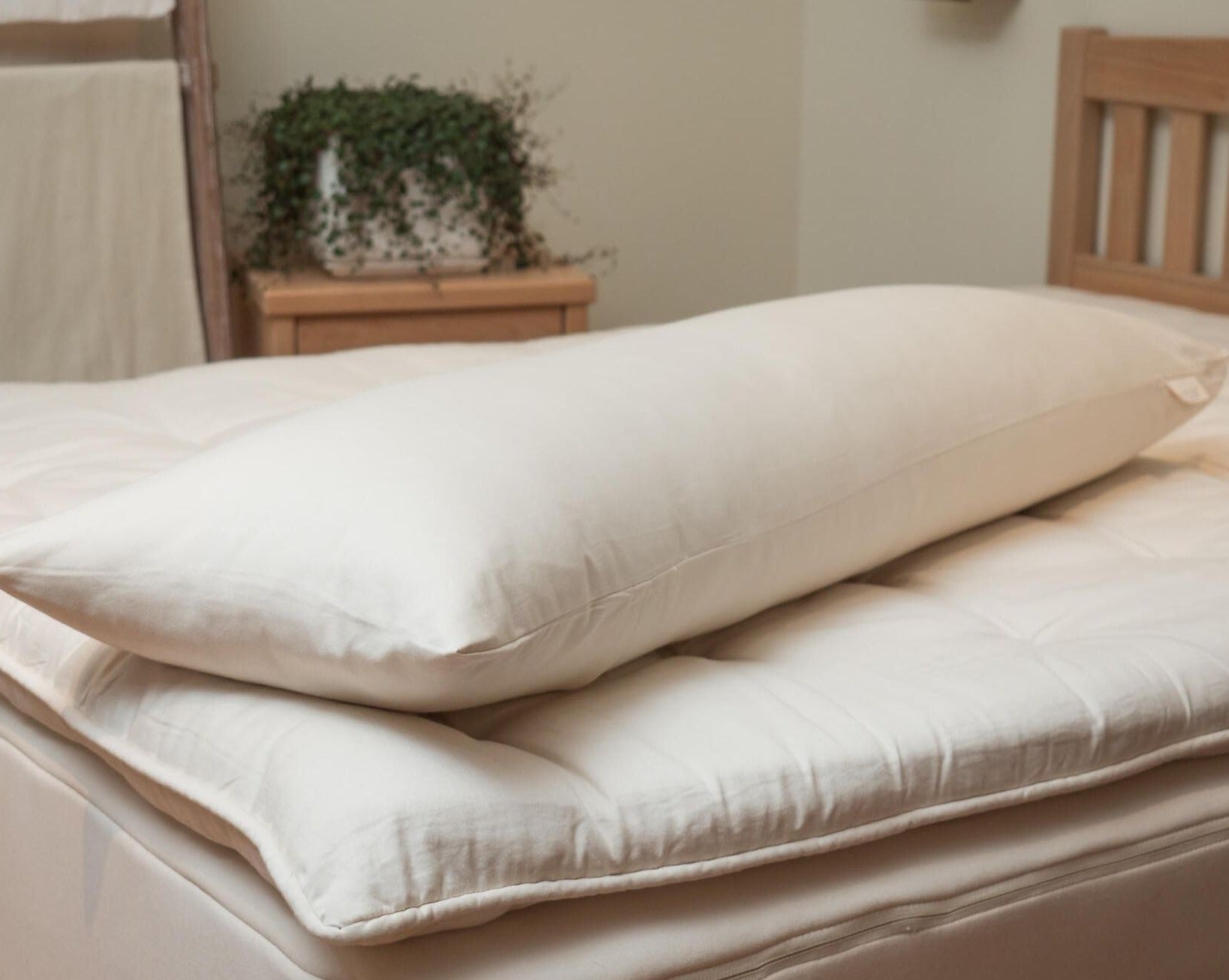 Kakun Organic Cotton Canvas Body Pillow Case - full length on bed with topper