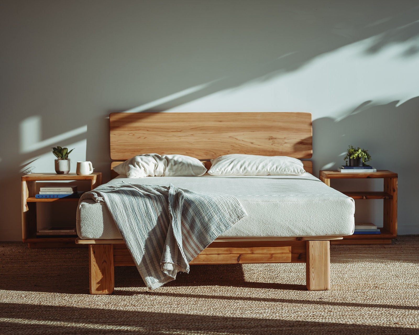 Adrift Cedar Crest Wood Frame - made bed with natural lighting